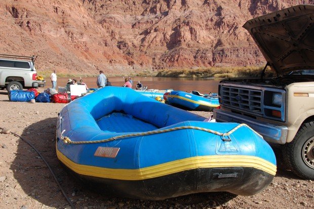 A raft sits on the beach